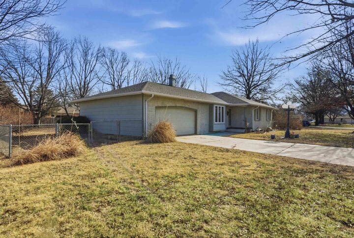 Property Photo:  209 W Garnett Ct  KS 67050 