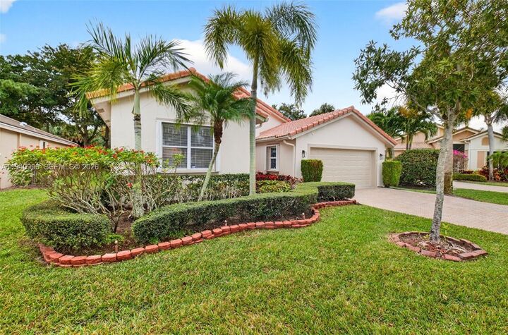 Property Photo: 8418 Marsala Way FL 33472