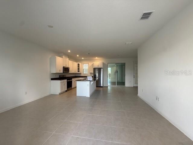 Property Photo:  1913 Seawall Way  FL 34747 