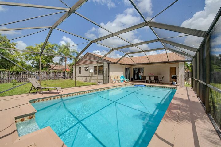 Property Photo:  11909 SW 48th Ct  FL 33330 