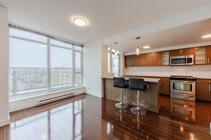 Property Photo: 8068 Westminster Highway 1801 BC V6X 0C6