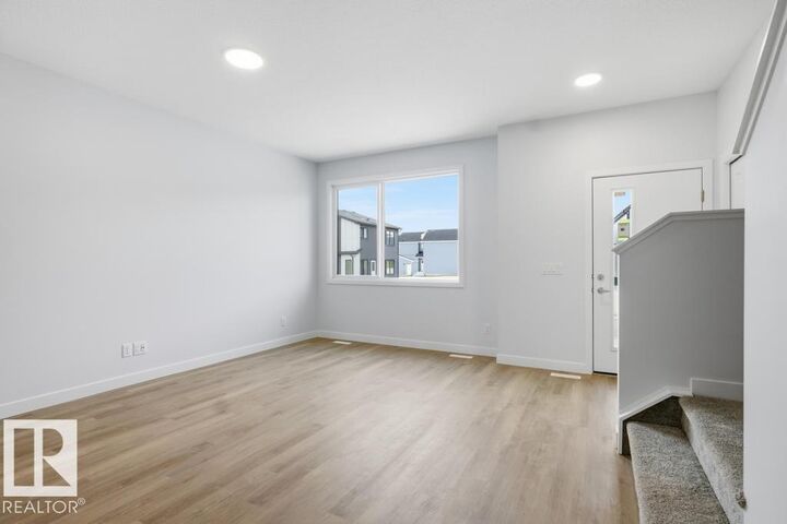 Property Photo:  9115 Elves Loop NW  AB T6M 3G2 