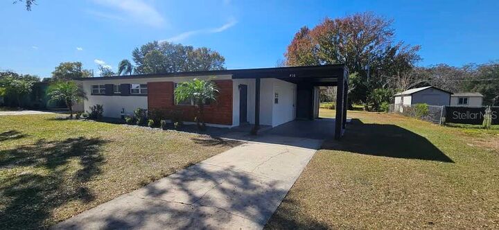 Property Photo:  410 S Oxalis Avenue  FL 32807 