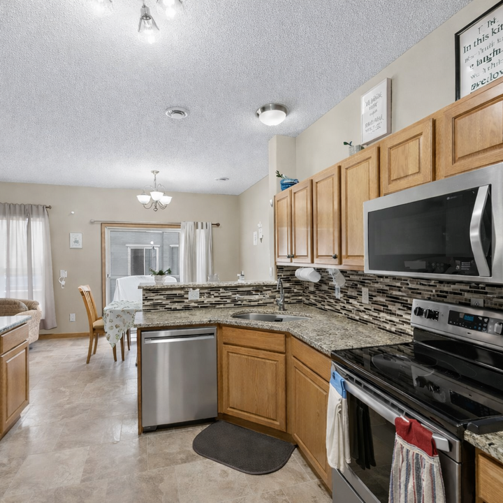 Property Photo: 6902 139th Lane NW 5 MN 55303