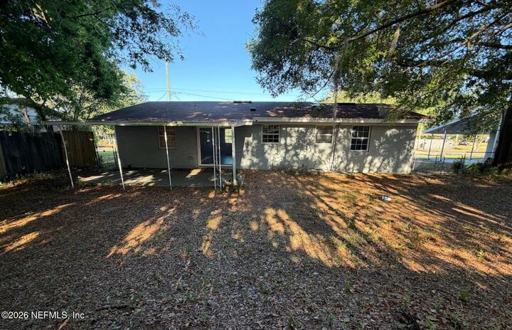 Property Photo:  5725 Hillman Drive  FL 32244 