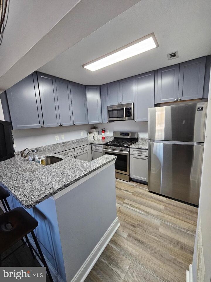 Property Photo:  20332 Beechwood Terrace 300  VA 20147 