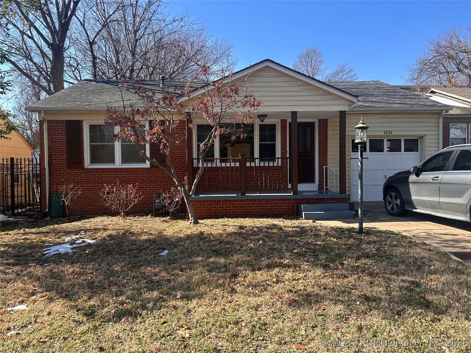 Property Photo:  1634 S Lewis Place  OK 74104 