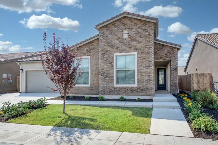 Property Photo:  7213 E Brown Ave  CA 93737 