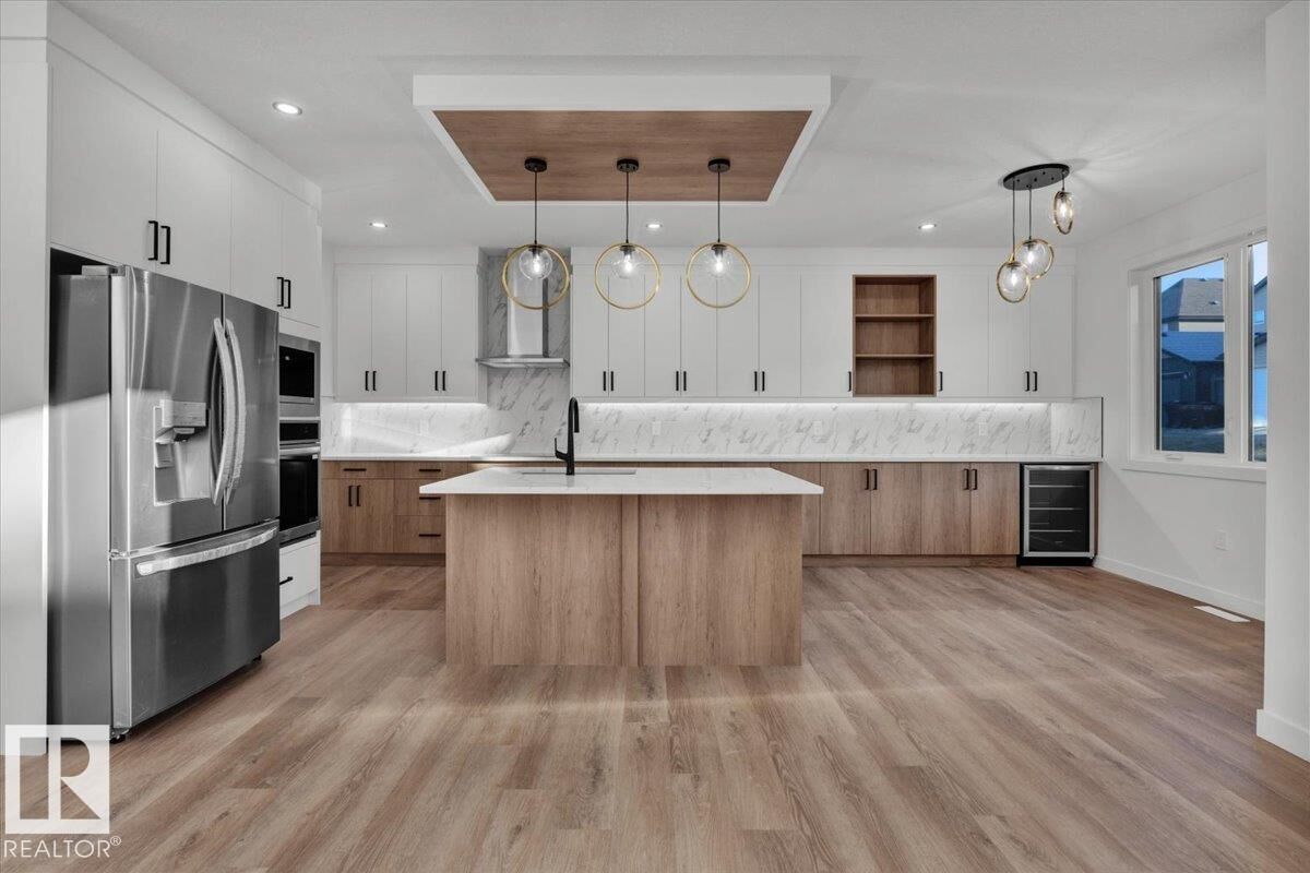 Property Photo:  1115 Gyrfalcon Crescent NW  AB T5S 0S1 