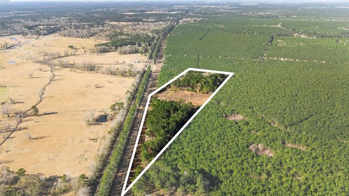 Property Photo:  1495 County Road 2200  TX 77327 