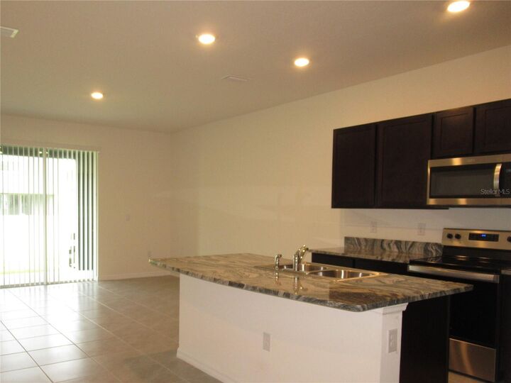 Property Photo: 33062 Frosted Clover Way FL 33545