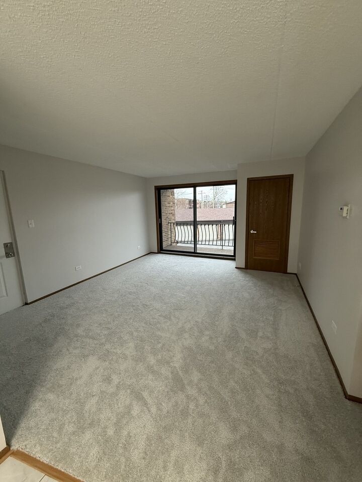 Property Photo:  17525 71st Court 2C  IL 60477 