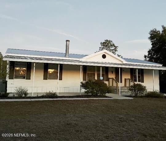 Property Photo:  5491 NE 141st Terrace  FL 32696 