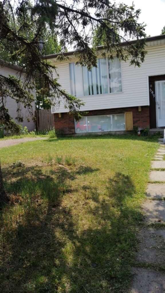 Property Photo: 649 Pineland Road NE AB T1Y 3L5