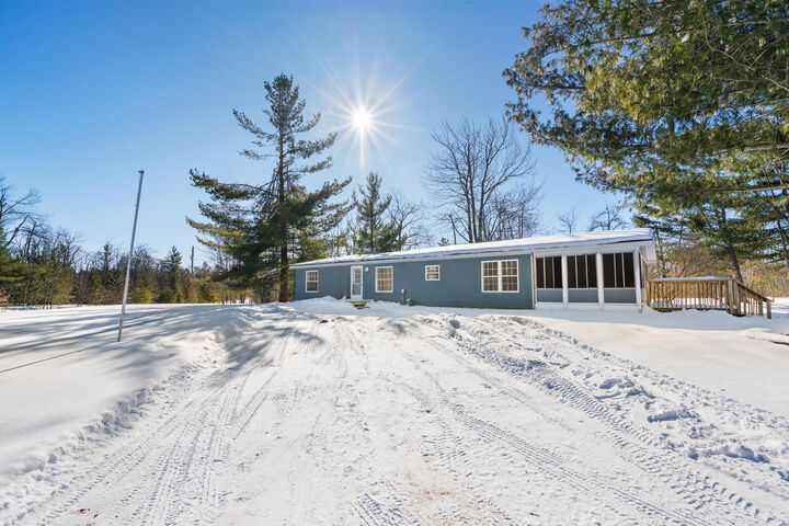 Property Photo:  10685 Upper Mograin Road  MI 49721 