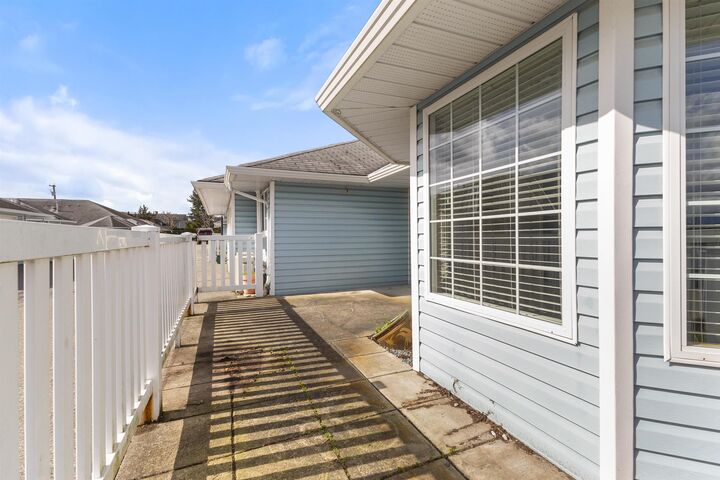 Property Photo:  1450 McCallum Road 8  BC V2S 8A5 