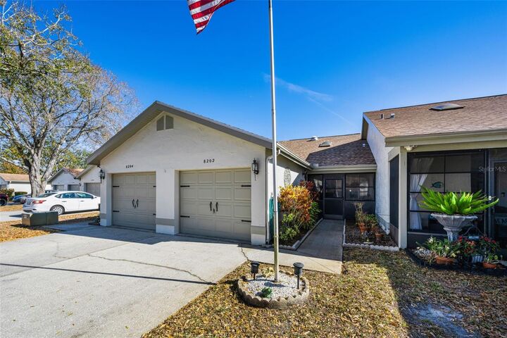 Property Photo:  8202 Leafy Court  FL 34668 