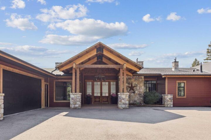 Property Photo:  226003 Priddis Valley Road W  AB T1S 5R2 