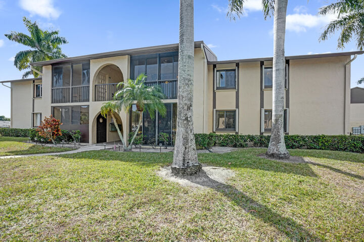 Property Photo:  426 Pine Glen Lane D-2  FL 33463 