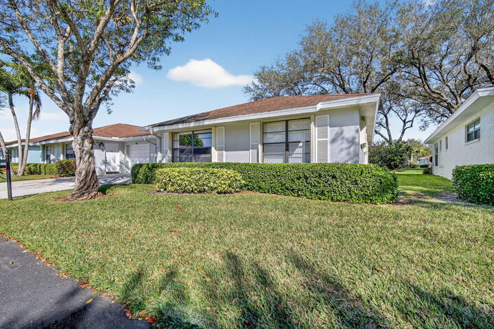 Property Photo:  9890 Orchid Tree Trail B  FL 33436 