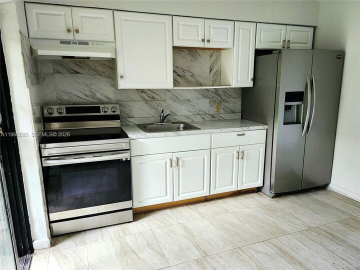 Property Photo:  11120 NW 6th Ave 11120  FL 33168 