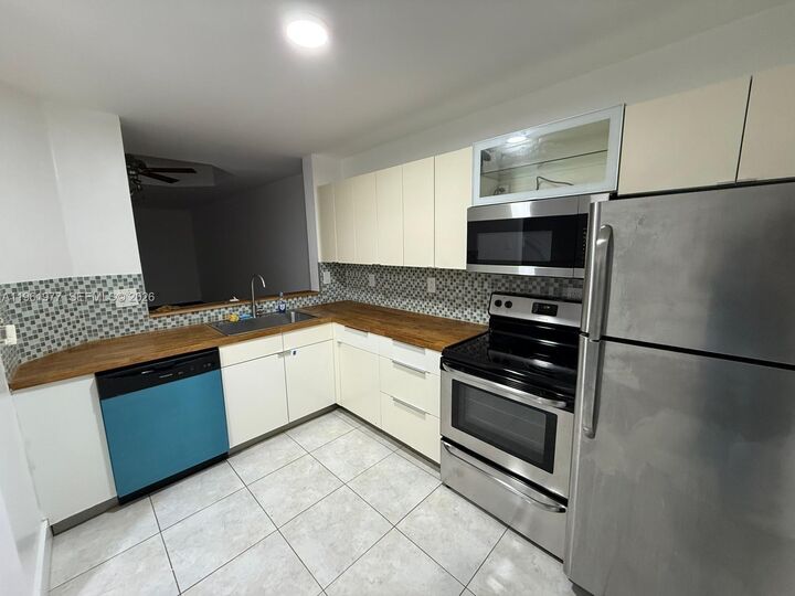 Property Photo: 14111 SW 121st Pl 4 FL 33186