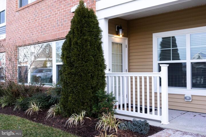 Property Photo:  24258 Zinfandel Lane #103  DE 19958 