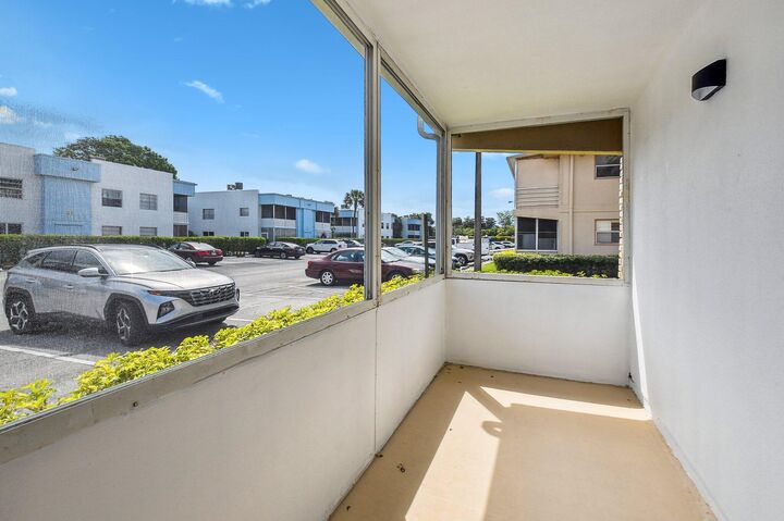 Property Photo:  447 Saxony J Way 447-J  FL 33446 