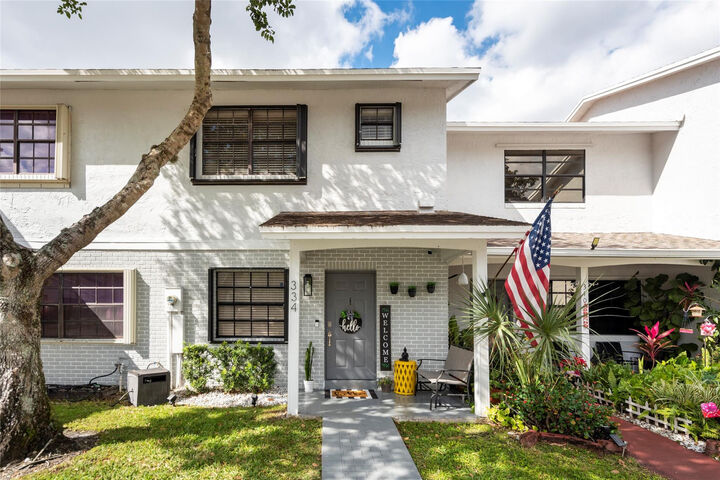 Property Photo:  334 NW 103rd Terrace 334  FL 33026 