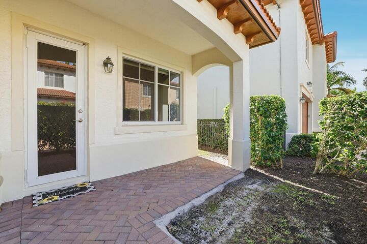 Property Photo:  148 NW Emerson Place  FL 33432 