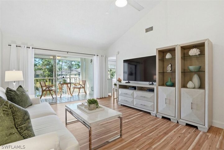 Property Photo:  5654 Woodmere Lake Circle C203  FL 34112 