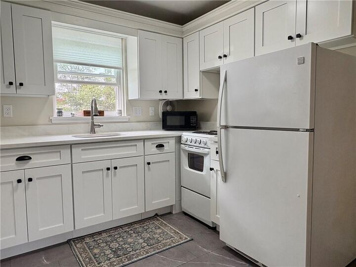 Property Photo:  70 Carroll Avenue 1210  RI 02840 