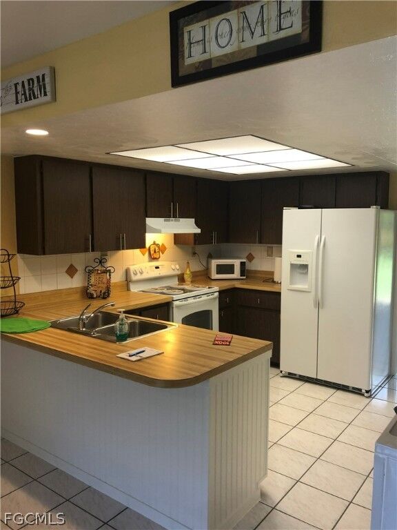 Property Photo:  1031 SE 9th Street 4  FL 33990 