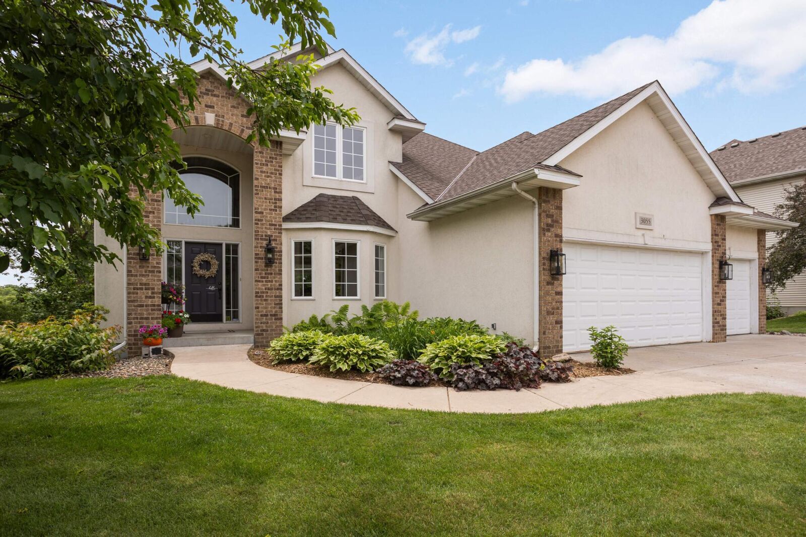 Property Photo: 3055 Knollridge Drive NW MN 55372