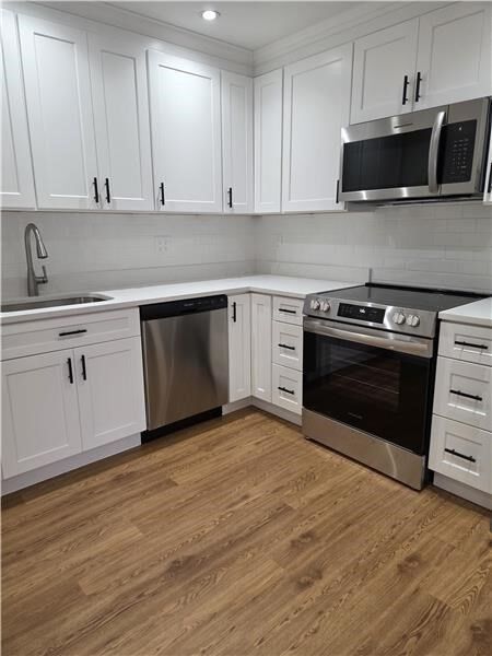 Property Photo:  1000 Lexington St 36  MA 02452 