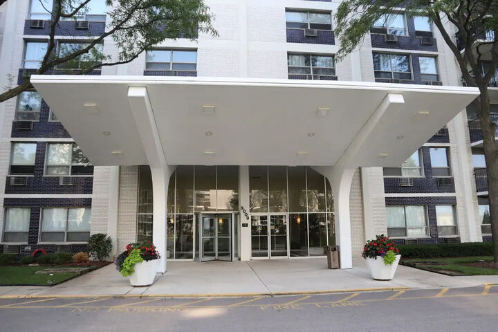 Property Photo:  9009 Golf Road 8B  IL 60016 