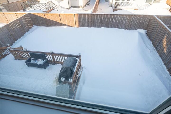 Property Photo: 99 Dacquay Crescent MB R2N 0J6