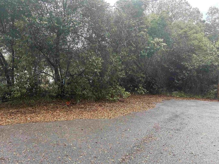 Property Photo:  8600 Handicare St  FL 32514 