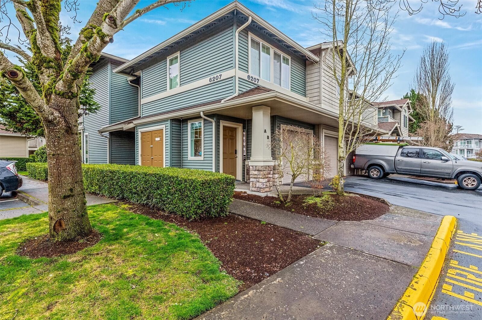Property Photo:  6207  Hazel Loop SE B-18  WA 98092 