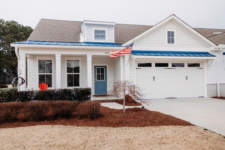 Property Photo:  210 Old Course Loop  VA 23310 