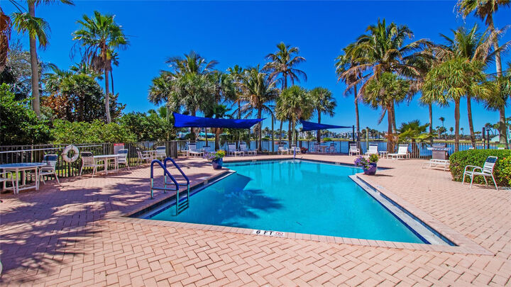 Property Photo: 221 NE Plantation Road 213 FL 34996