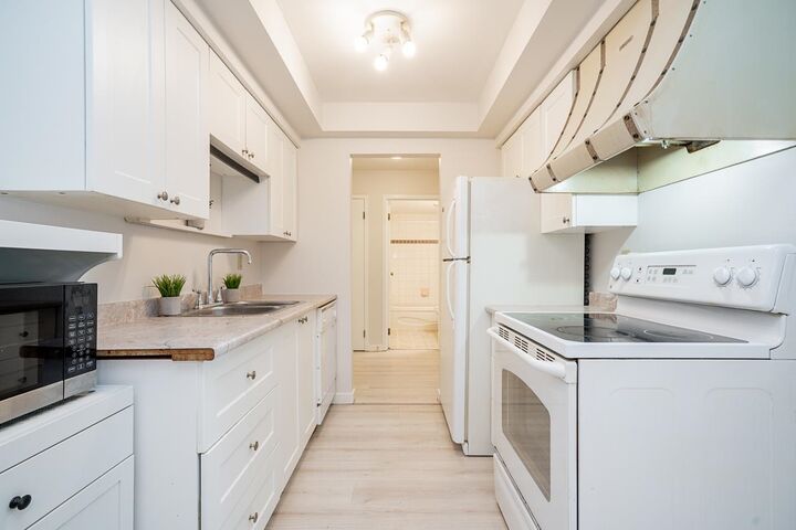 Property Photo:  106 33956 Essendene Avenue  BC V2S 6E7 