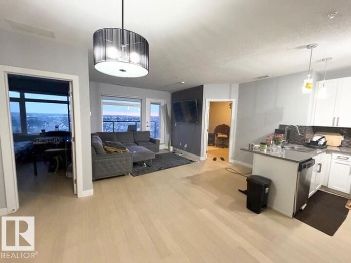 Property Photo:  5151 Windermere Bv SW 706  AB T6W 2K4 