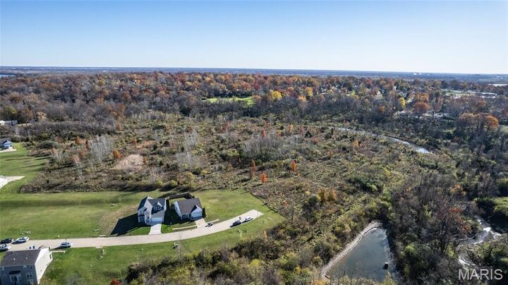 Property Photo:  10940 John James Drive  MO 63137 