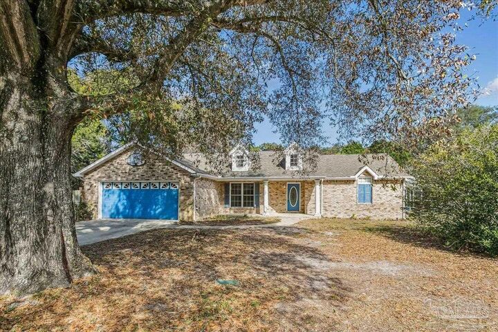 Property Photo:  100 Oviedo St  FL 32561 