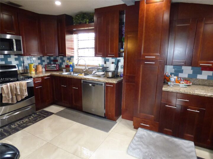 Property Photo:  18813 NW 32nd Ave  FL 33056 