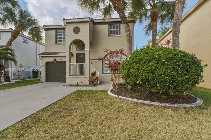 Property Photo:  324 NW 153rd Ln  FL 33028 