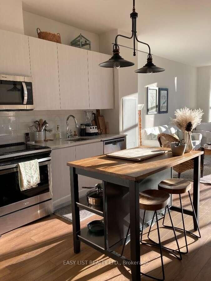 Property Photo: 21 Matchedash Street S 316 ON L3V 4W4