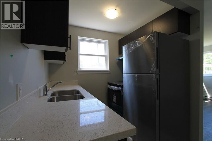 Property Photo:  116 King Edward Avenue 11  ON N5Z 3T1 