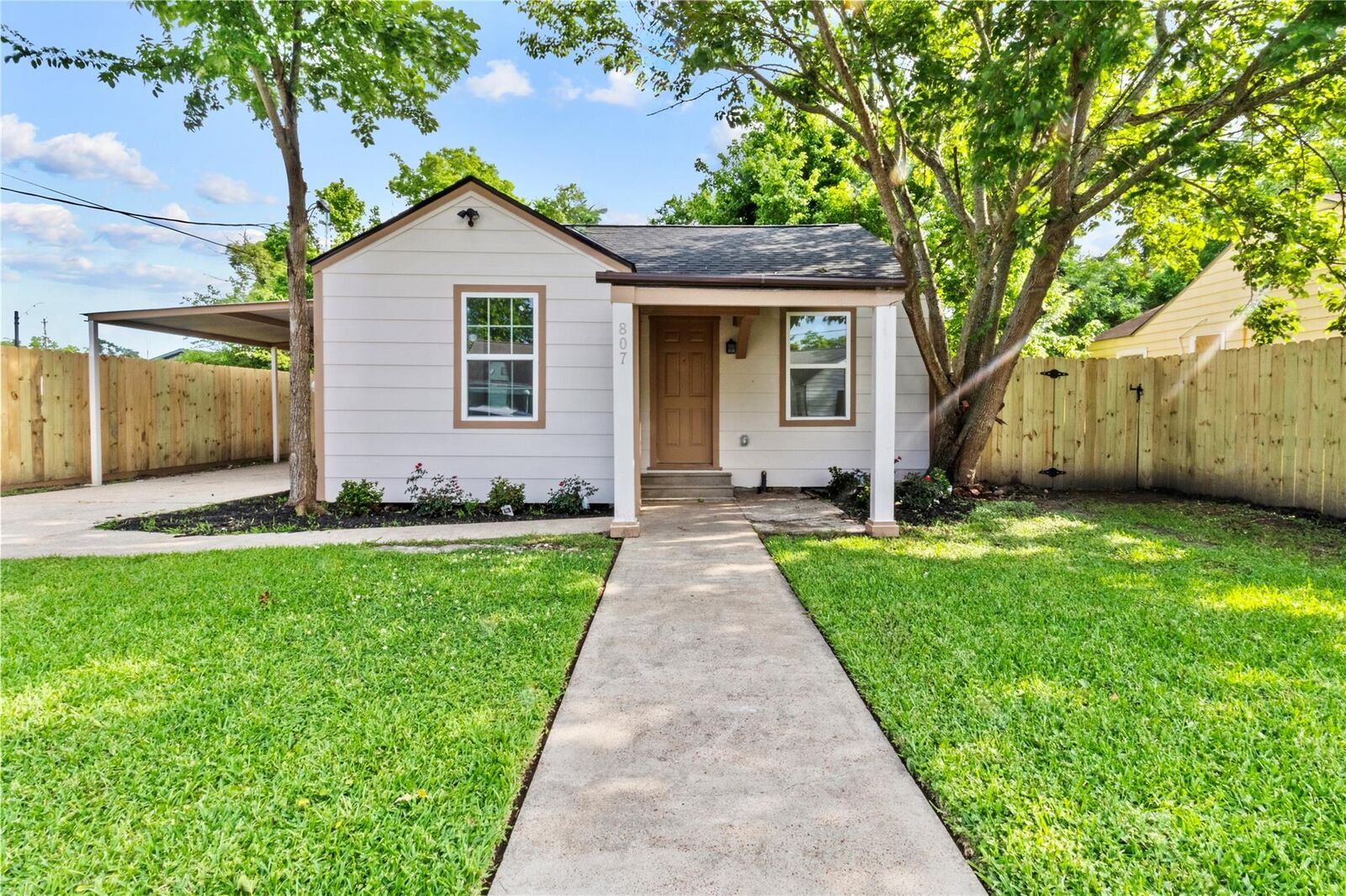 Property Photo:  807 Aron Street  TX 77520 